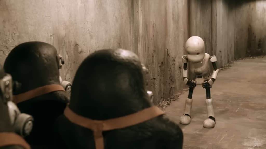 A humanoid robot stands in a dimly lit, concrete corridor facing two large, dark figures